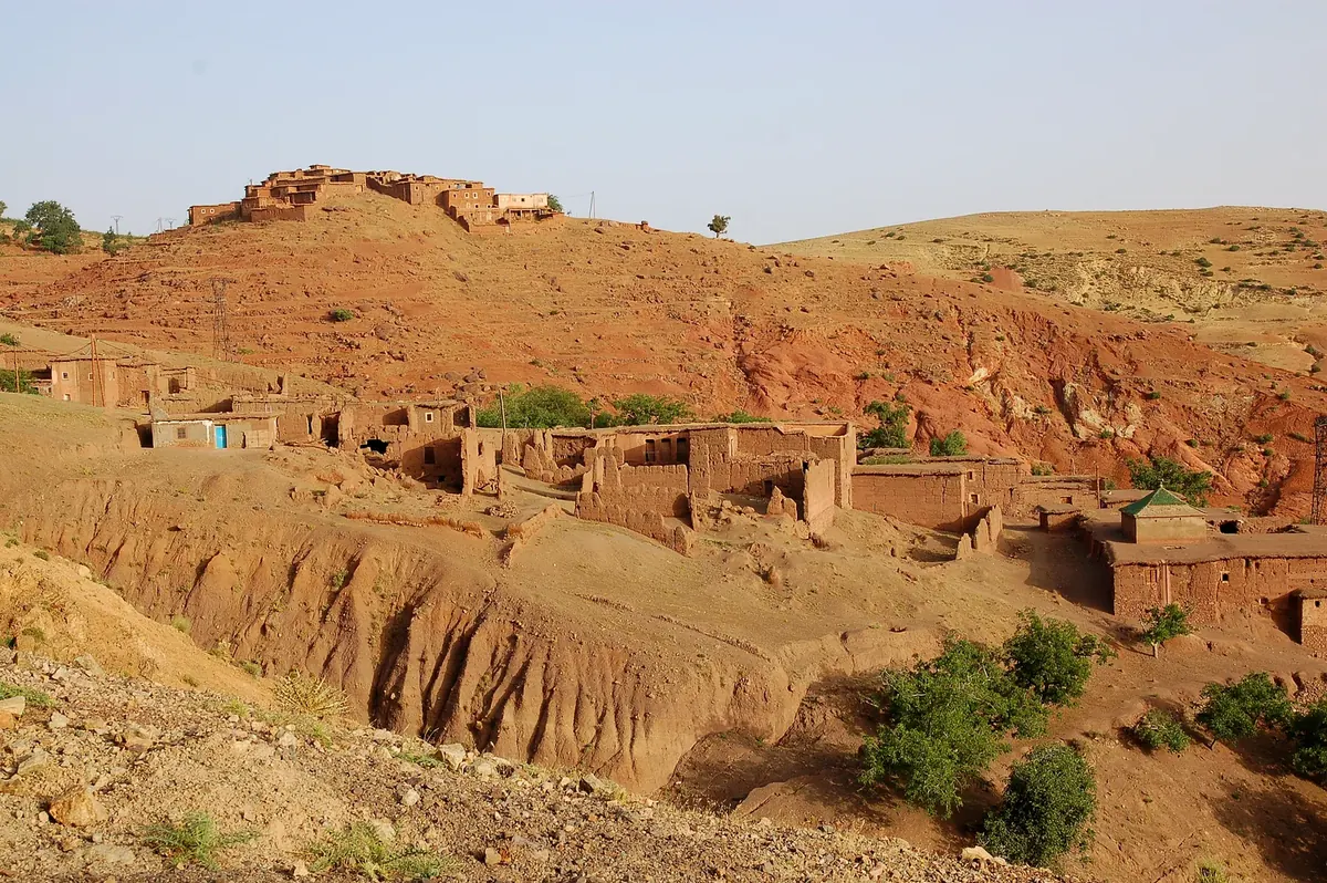 Mountain village and surrounding slopes in the Imlil valley of Morocco’s High Atlas.