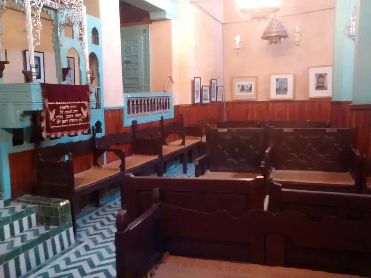 Interior of the Ibn Danan Synagogue in Fez, with its painted decorative surfaces and furnishings.