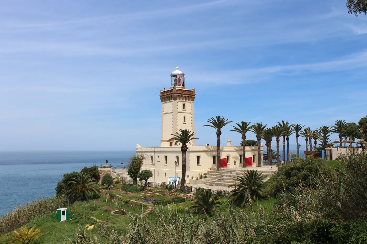 Cape Spartel lighthouse and palm-lined grounds above the sea near Tangier, Morocco.