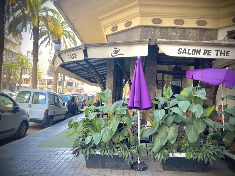 A café and tea-room frontage with plants on Boulevard Hassan Seghir in Casablanca.