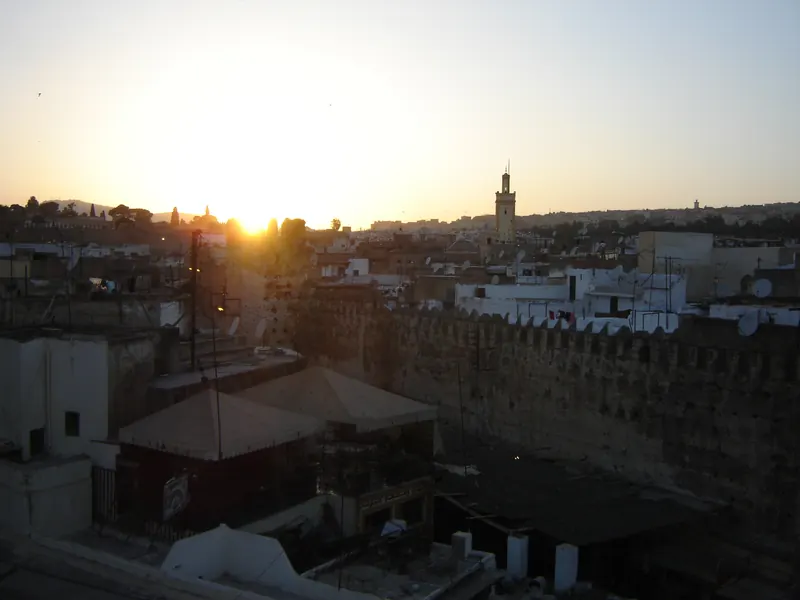Sunset over the rooftops and walls of Fes medina in 2005.