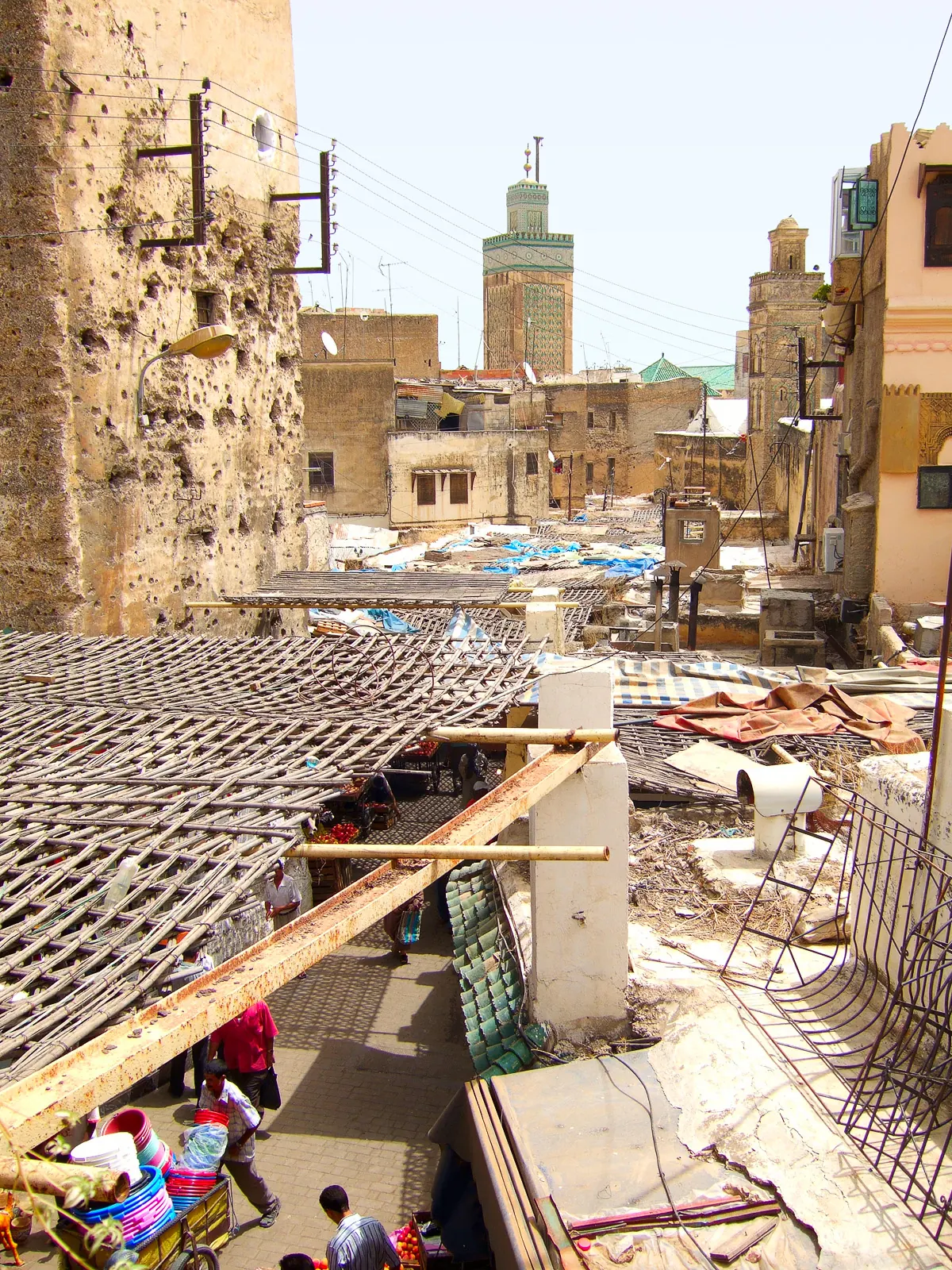 View over market roofs and a minaret in Fez medina from a restaurant near Bab Boujloud