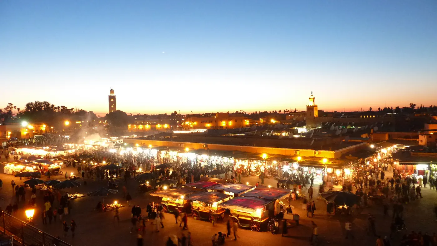 Dusk view over the crowd in Jemaa el-Fna square in Marrakech