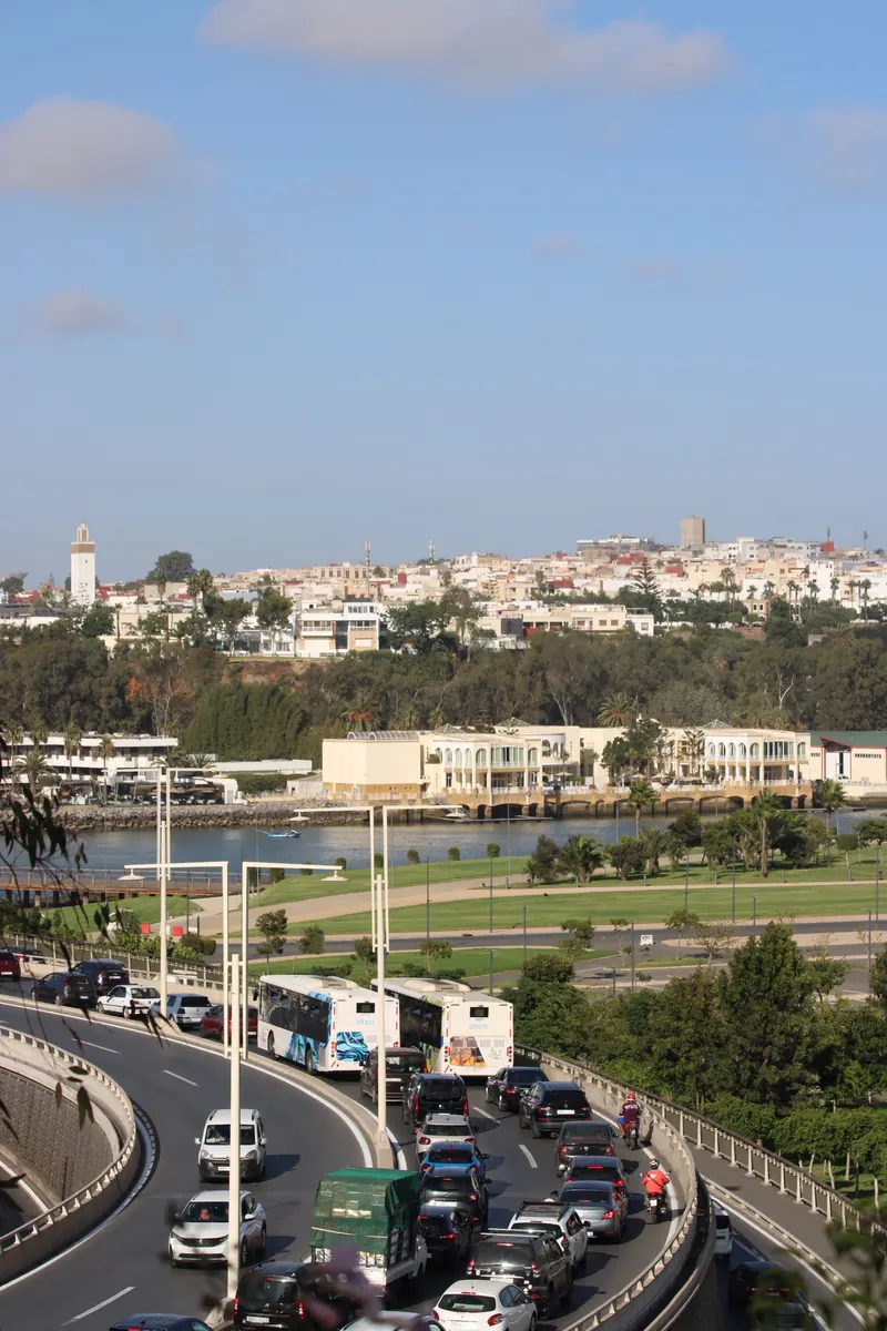 Traffic on a curved road with Rabat skyline in Morocco