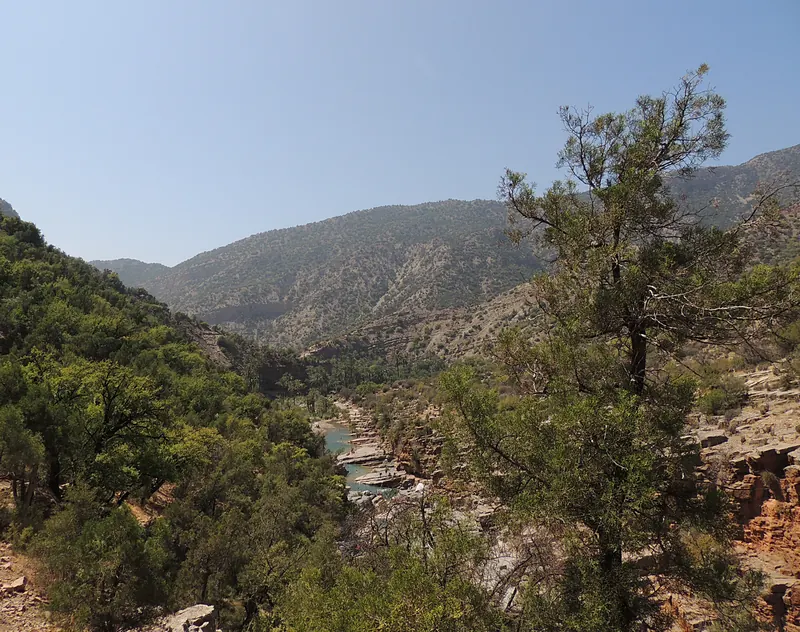 Wide view of the Tamraght River valley and rocky terrain in Paradise Valley, Morocco
