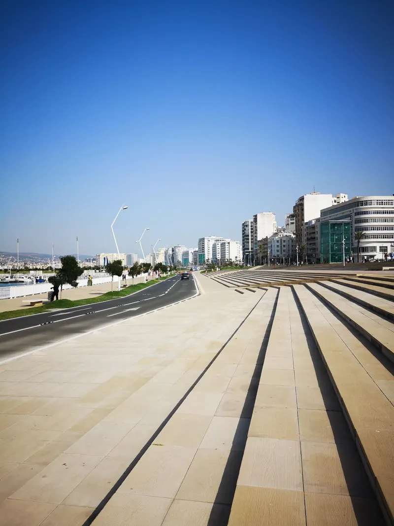 Pedestrian steps, road and waterfront at Tangier's Marina Bay area.
