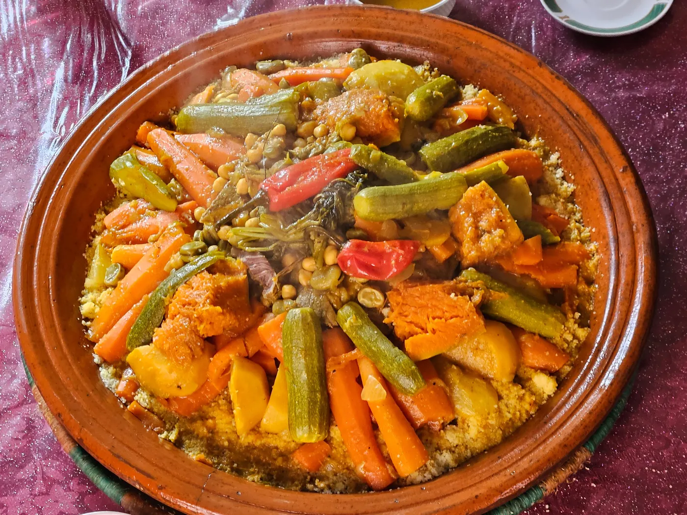 Moroccan vegetable tagine with carrots and zucchini in a serving dish